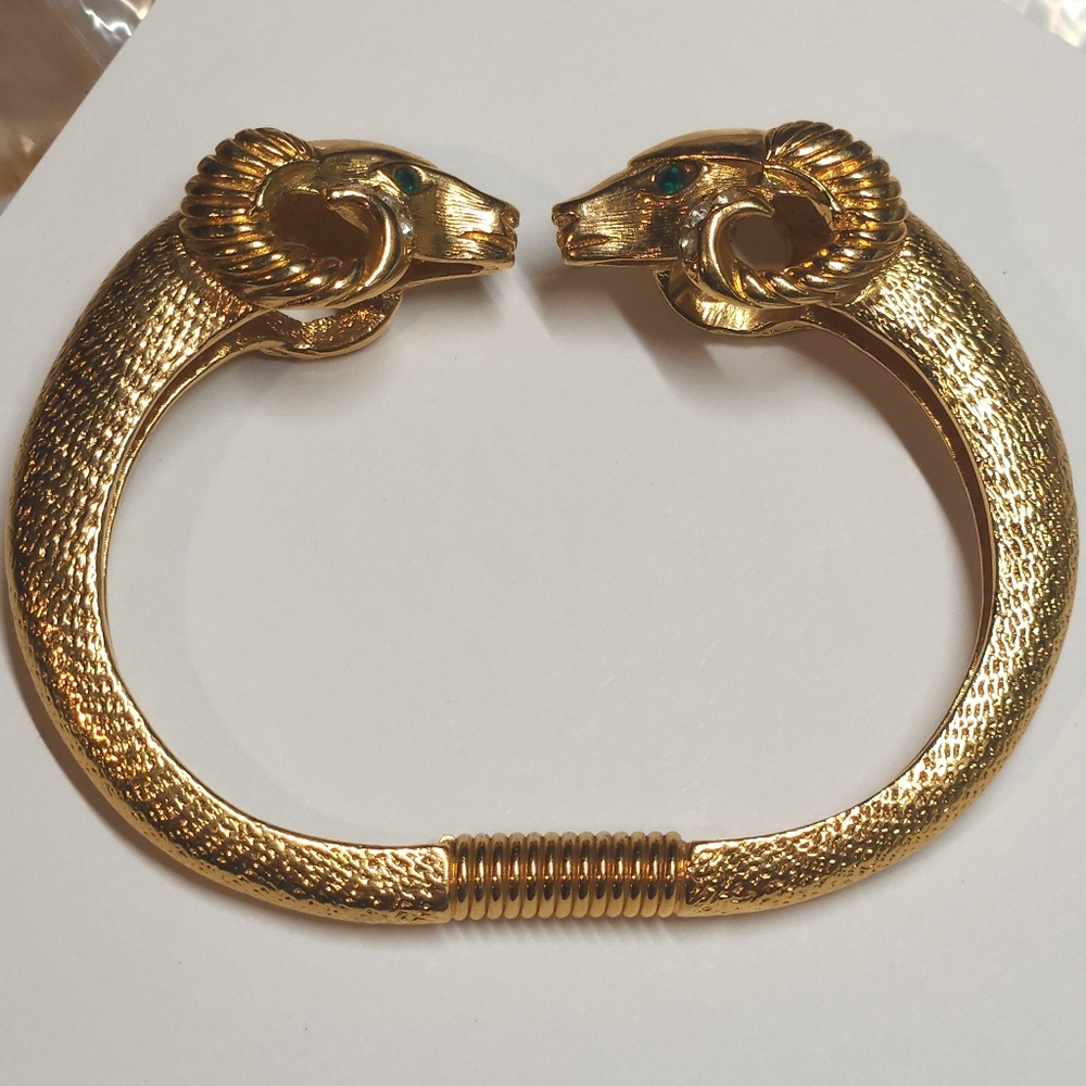 ​Vintage KJL for Avon Ram Head Clamper Bracelet Gold Tone Emerald Eyes Signed